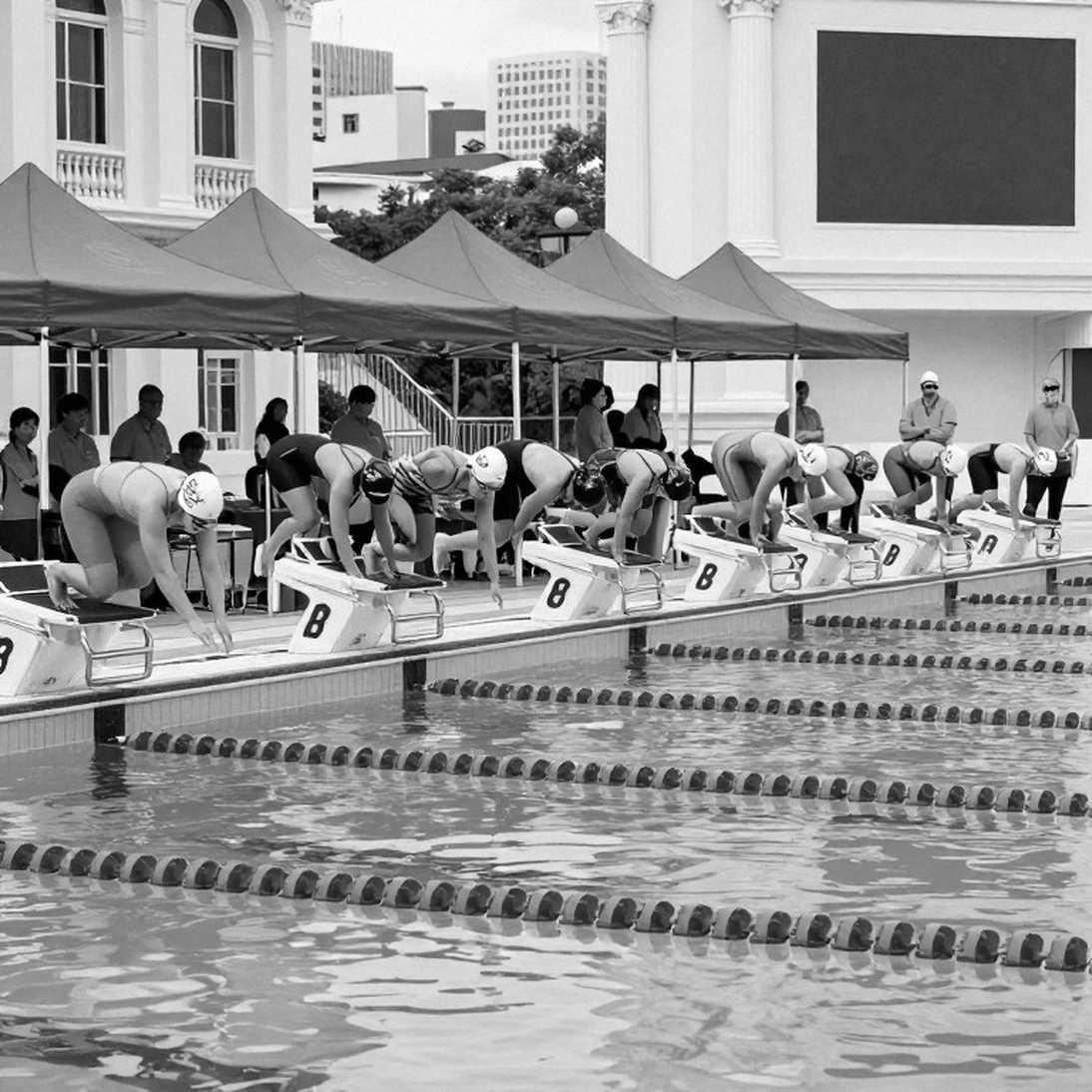 52.11 in the 100 IM: A Record Written in Three Pool Languages